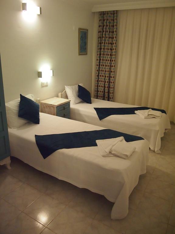 Ozcem Apart Aparthotel เฟทิเย ภายนอก รูปภาพ